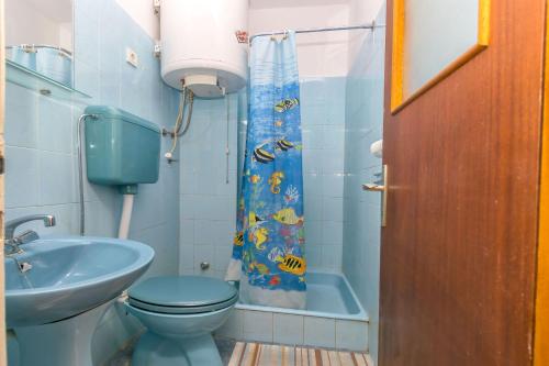 Ένα μπάνιο στο Apartment and Rooms Angela