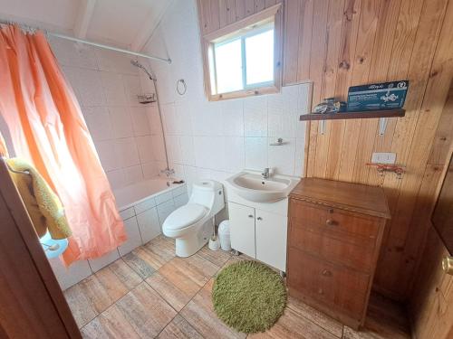Um banheiro em Cabañas Los Notros