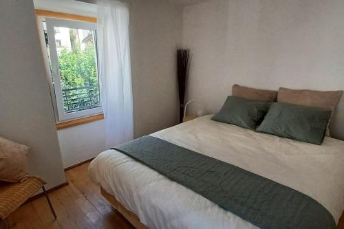 Postel nebo postele na pokoji v ubytování Casa Leventina