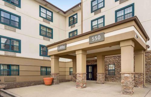a large building with a clock on it at Extended Stay America Suites - Chicago - Elmhurst - O'Hare in Elmhurst
