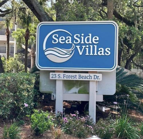a sign for asea side villas in front of a house at Beachfront Condo with Ocean View in Hilton Head Island
