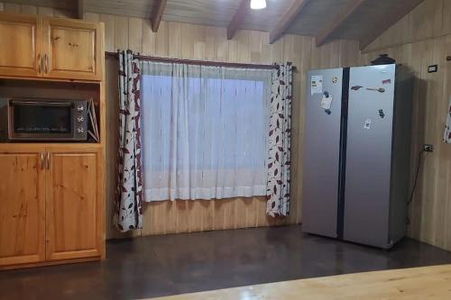 A kitchen or kitchenette at Casa campo, familiar