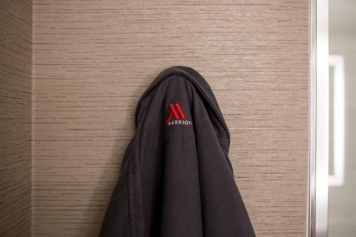 a black robe hanging on a wall at Napa Valley Marriott Hotel & Spa in Napa