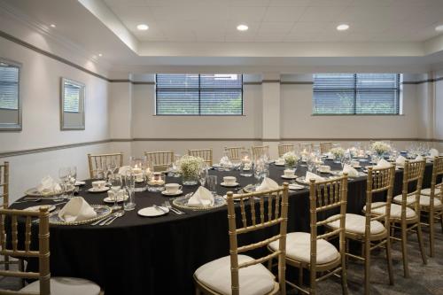 a conference room with a long table and chairs at Delta Hotels by Marriott Liverpool City Centre in Liverpool