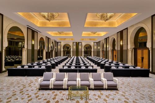 a large room with rows of tables and chairs at Sheraton Imperial Kuala Lumpur Hotel in Kuala Lumpur