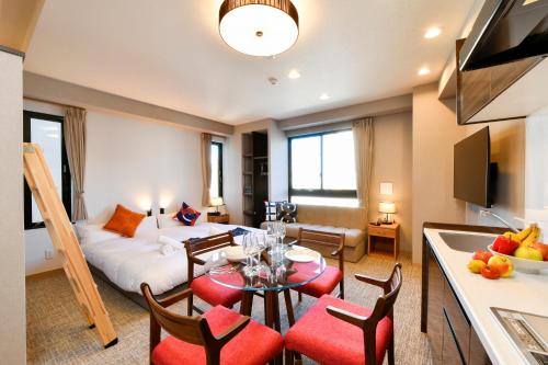 a kitchen and a living room with a dining room at ENT TERRACE AKIHABARA in Tokyo