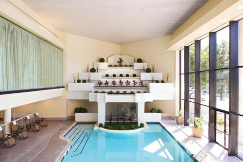 a rendering of a pool in a hotel lobby at BWI Airport Marriott in Linthicum Heights