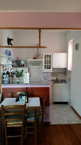 Кухня или мини-кухня в Apartments Milica
