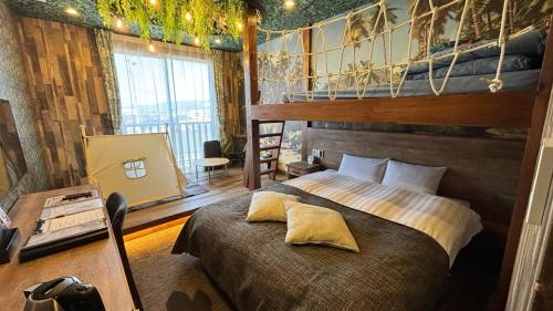 Postel nebo postele na pokoji v ubytování Hotel cooju Fukui
