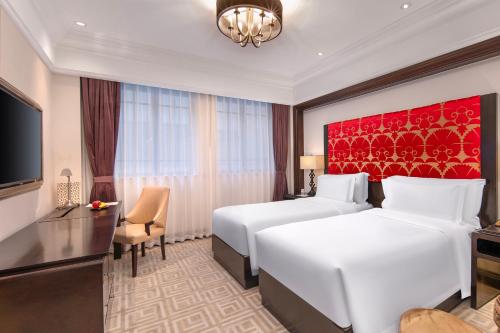 Un ou plusieurs lits dans un hébergement de l'établissement The Yangtze Boutique Shanghai
