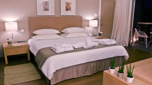 Katil atau katil-katil dalam bilik di Alasia Boutique Hotel