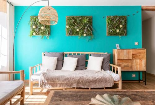 Ένα ή περισσότερα κρεβάτια σε δωμάτιο στο Le Nature à Kaysersberg + 1 place de parking