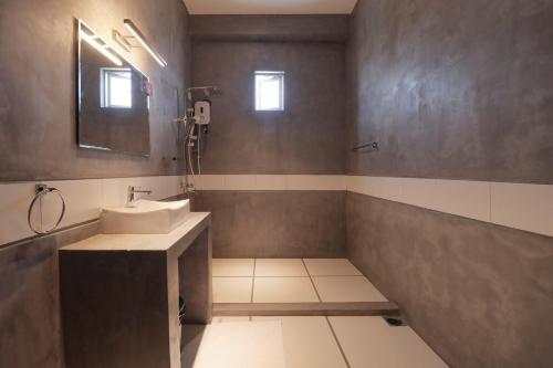 Koupelna v ubytování Wonmi Residency