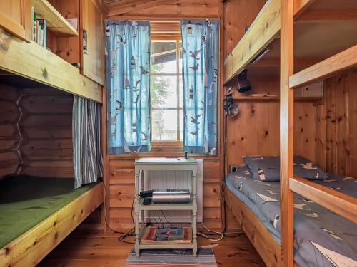 Palanda nebo palandy na pokoji v ubytování 4 star holiday home in YXLAN