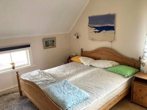 Un pat sau paturi într-o cameră la 4 person holiday home in BURTRÄSK