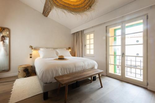 Katil atau katil-katil dalam bilik di Casa Collioura & Spa