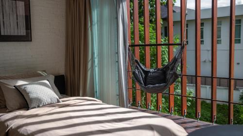The Hotel Journal Chiangmaiにあるベッド
