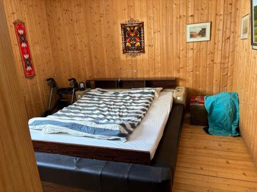 Postel nebo postele na pokoji v ubytování 7 person holiday home in TANA