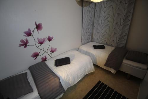 Llit o llits en una habitació de MajoitusYkkönen