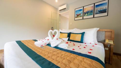 Postel nebo postele na pokoji v ubytování Sandunes Beach Resort & Spa