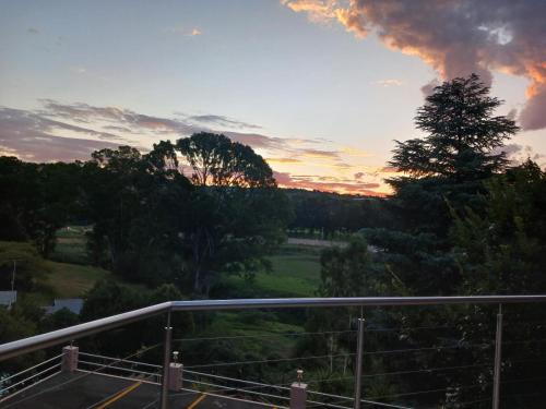 a view of a sunset from a parking lot at Blue Sky Manor in Roodekrans