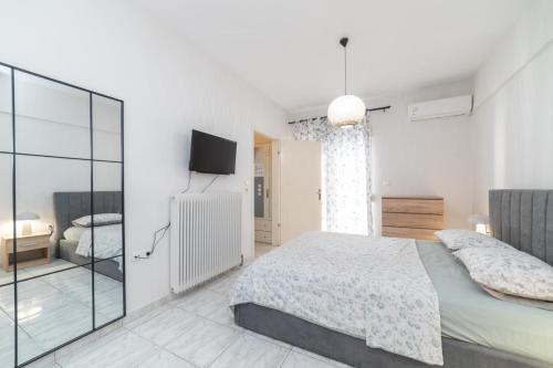 Ένα ή περισσότερα κρεβάτια σε δωμάτιο στο Ninas Central apartment