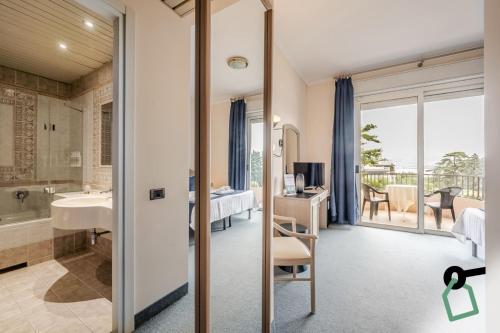 Koupelna v ubytování Hotiday Room Collection - Stresa