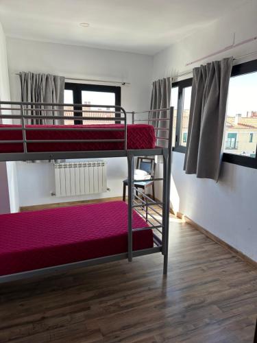Postel nebo postele na pokoji v ubytování Apartamentos el soho