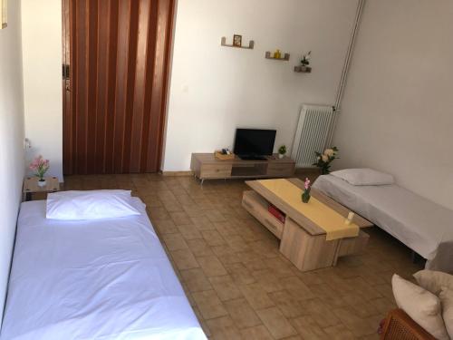 Postel nebo postele na pokoji v ubytování Σταματάκης