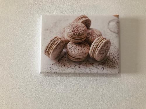 a group of cookies on a plate on a wall at Σταματάκης in Sitia