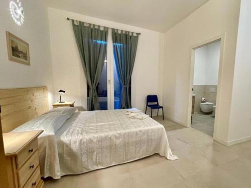 Ένα ή περισσότερα κρεβάτια σε δωμάτιο στο Villa Dinesh