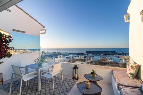 MARBELLA BANUS SUITES - Brand New Exclusive Puerto Banús Port Seafront Apartment - 2BR - 2BA - Outdoor Terrace - Spectacular Mediterranean Views - Heart of Puerto Banús Marina - Steps from El Corte Ing Luxury Shopping