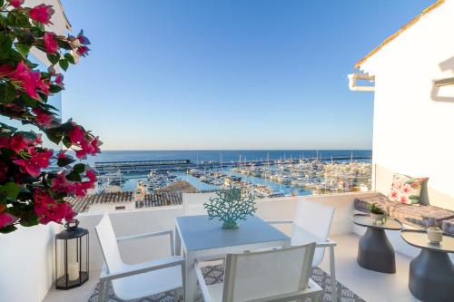 MARBELLA BANUS SUITES - Brand New Exclusive Puerto Banús Port Seafront Apartment - 2BR - 2BA - Outdoor Terrace - Spectacular Mediterranean Views - Heart of Puerto Banús Marina - Steps from El Corte Ing Luxury Shopping