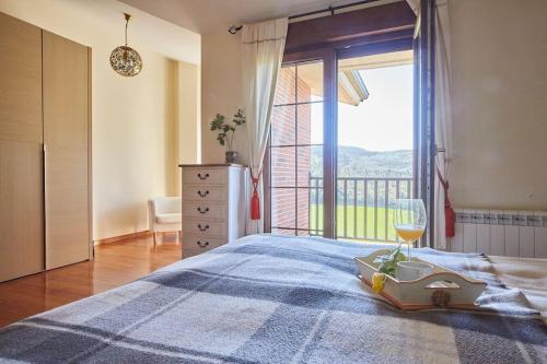 Postel nebo postele na pokoji v ubytování El Balcón de Comillas, chalet con jardín