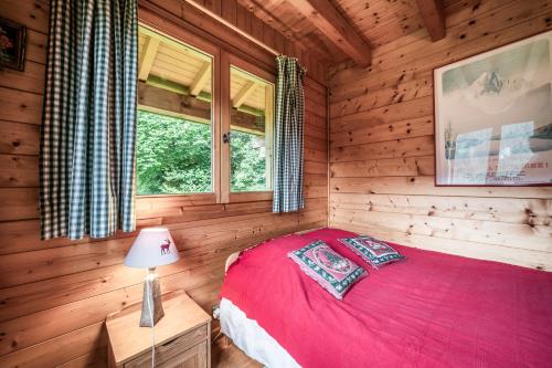 Кровать или кровати в номере La Rissole - Chalet familial