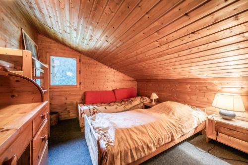 Кровать или кровати в номере La Rissole - Chalet familial