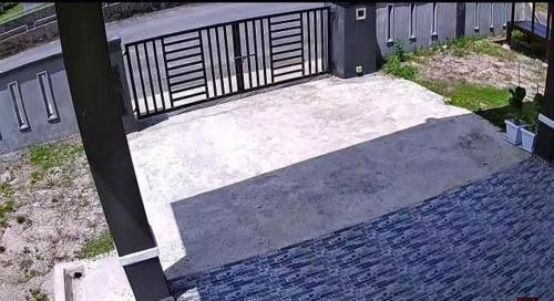 an overhead view of a driveway with a gate at Homestay Kuala Dungun in Dungun