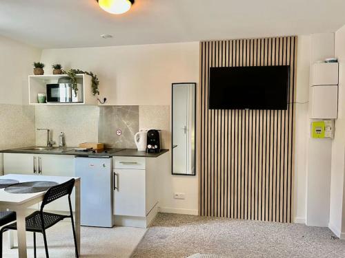 Η κουζίνα ή μικρή κουζίνα στο Studio 4 Rue Théodore Bac - DABNB