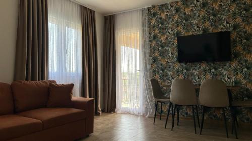 TV a/nebo společenská místnost v ubytování Apartmani Radmanovic