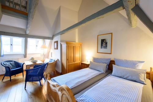 Postel nebo postele na pokoji v ubytování Hotel Pension St Nikolai