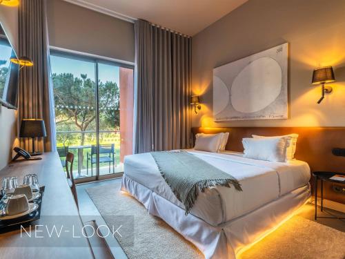 Кровать или кровати в номере Aqua Pedra Dos Bicos Design Beach Hotel - Adults Friendly