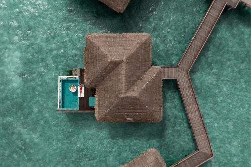 an overhead view of a bridge in the water at Sheraton Maldives Full Moon Resort & Spa in North Male Atoll