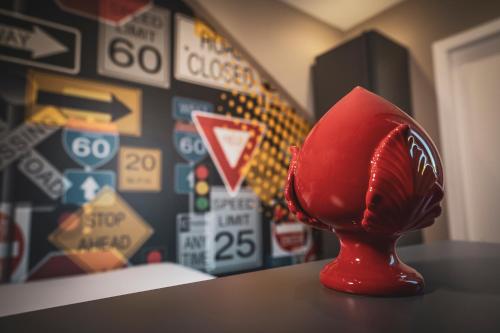 a red object sitting on top of a table at Testani Guest House Special in Anagni