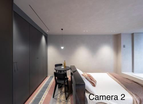 Letto o letti in una camera di Berht - Appartamenti al centro di Catania