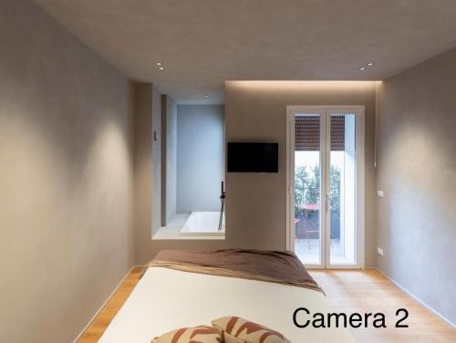 TV o dispositivi per l'intrattenimento presso Berht - Appartamenti al centro di Catania