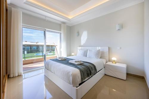 Ένα ή περισσότερα κρεβάτια σε δωμάτιο στο Boa Vista - Casa Jacques