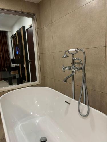 Un baño de MARIYALAYAM MUNROE ISLAND RESIDENCY