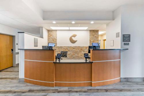 a lobby with a reception desk in a hospital at Comfort Inn & Suites in New Lisbon