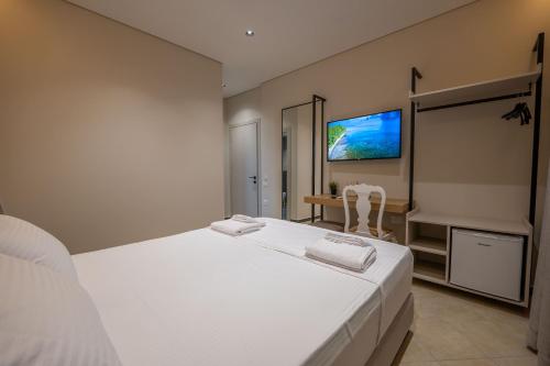 Postel nebo postele na pokoji v ubytování Villa Serenity