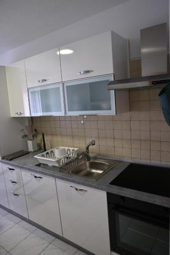 Dapur atau dapur kecil di Apartma Pers